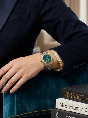 Versace Gold and Silver Timepiece with Blue Face